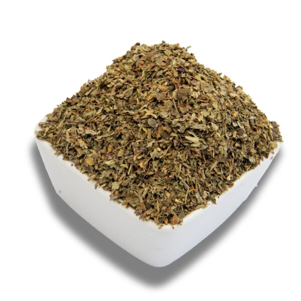 A bowl filled with dried basil leaves, showcasing their texture and color.