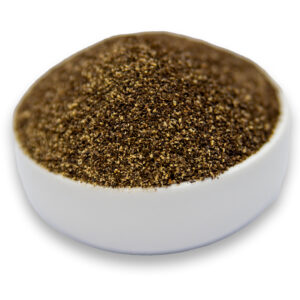 Bowl filled with finely ground black pepper – bold, aromatic spice for cooking and seasoning.